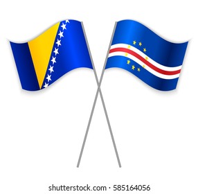 Bosnian and Cabo Verdean crossed flags. Bosnia and Herzegovina combined with Cape Verde isolated on white. Language learning, international business or travel concept.