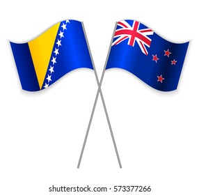 Bosnian and NZ crossed flags. Bosnia and Herzegovina combined with New Zealand isolated on white. Language learning, international business or travel concept.