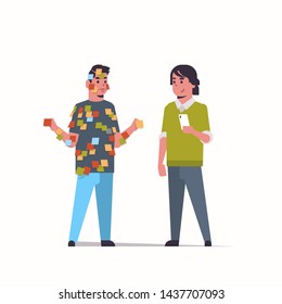 boss with male manager covered with stick notes business planning teamwork concept couple businessmen standing together flat full length