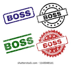 BOSS seal imprints with damaged style. Black, green,red,blue vector rubber prints of BOSS text with dust style. Rubber seals with round, rectangle, rosette shapes.