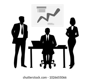 The boss sitting at the table communicating with his subordinates.