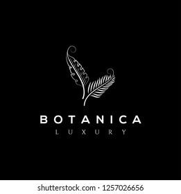 Botanic vector logo. Luxury letter monogram. Fashion brand identity. Golden Leaves Plant Logo design. Hotel or boutique emblem