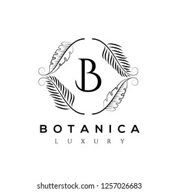 Botanic vector logo. Luxury letter monogram. Fashion brand identity. Golden Leaves Plant Logo design. Hotel or boutique emblem