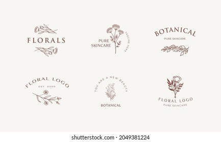 Botanical Floral element Hand Drawn Logo with Wild Flower and Leaves. Logo for spa and beauty salon, boutique, organic shop, wedding, floral designer, interior, photography, cosmetic.
