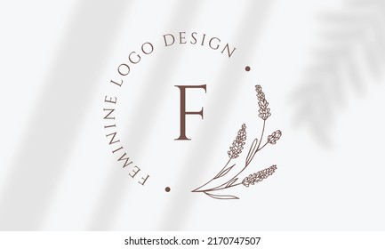 Botanical Floral element Hand Drawn Logo with Wild Flower and Leaves. Logo for spa and beauty salon, boutique, organic shop, wedding, floral designer, interior, photography, cosmetic.