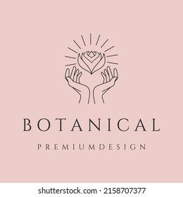 botanical lotus with sunburst premium line logo vector symbol illustration design