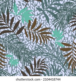 Botanical seamless pattern mixed with leopard spots skin print texture. Hand drawn fantasy exotic sprigs and leafage. Floral background made of herbal foliage leaves for fashion,  textile, fabric.