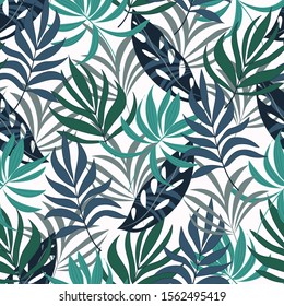 Botanical seamless tropical pattern with bright green plants and leaves on a blue background. Summer colorful hawaiian seamless pattern with tropical plants.  Vector design. Jungle print. Floral backg