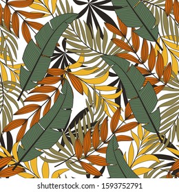 Botanical seamless tropical pattern with bright green and orange plants and leaves on a light background. Beautiful seamless vector floral pattern. 
Jungle leaf seamless vector floral pattern.
