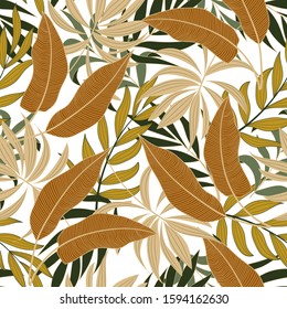 Botanical seamless tropical pattern with bright green and yellow plants and leaves on delicate background. Modern abstract design for fabric, paper, interior decor.