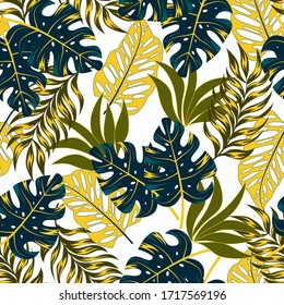 Botanical seamless tropical pattern with bright plants and leaves on a delicate background. Tropic leaves in bright colors. Hawaiian style. Colorful stylish floral.
