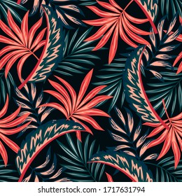 Botanical seamless tropical pattern with bright plants and leaves on a dark background. Modern abstract design for fabric, paper, interior decor. Beautiful exotic plants. 