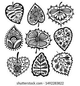 Botanical set made of decorative leaves. Silhouettes of leaves isolated on white. Abstract ornamental elements and plants. Vector flat illustration.