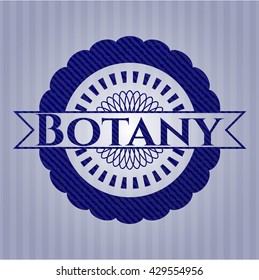 Emblema botánico con fondo jean