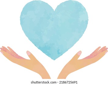 Ambas manos sostienen un corazón azul flotante