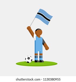 Botswana soccer player in kit with flag and ball
