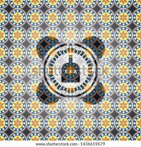 bottle of alcohol icon inside arabic style badge. Arabesque decoration.