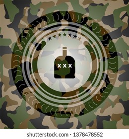 bottle of alcohol icon inside camouflaged emblem