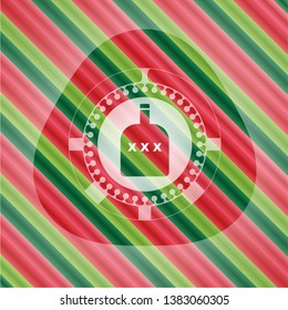 bottle of alcohol icon inside christmas colors badge.