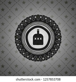 bottle of alcohol icon inside dark emblem. Retro