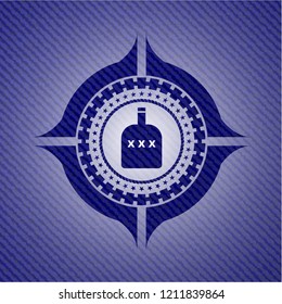 bottle of alcohol icon inside emblem with denim high quality background