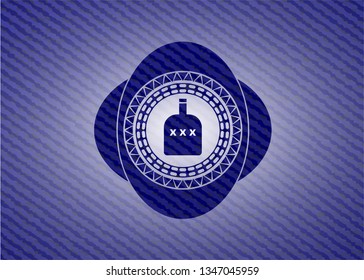 bottle of alcohol icon inside emblem with jean texture