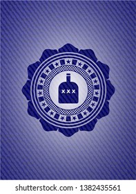 bottle of alcohol icon inside emblem with denim texture