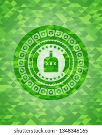 bottle of alcohol icon inside realistic green mosaic emblem