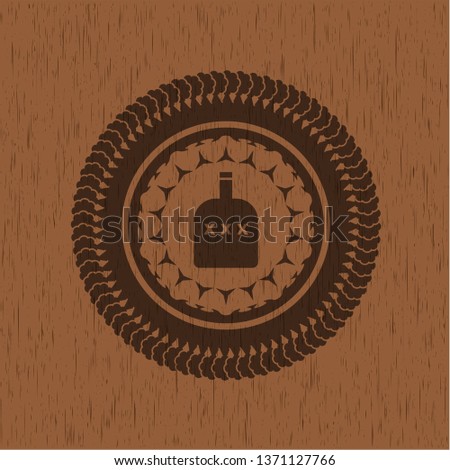 bottle of alcohol icon inside realistic wooden emblem