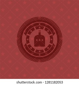 bottle of alcohol icon inside red icon or emblem