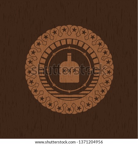 bottle of alcohol icon inside retro wood emblem