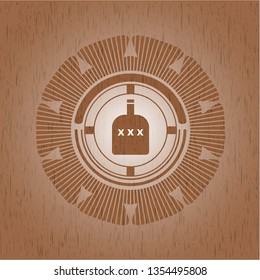 bottle of alcohol icon inside wooden emblem. Retro