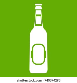Bottle of beer icon white isolated on green background. Vector illustration
