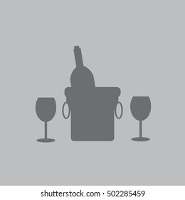 Bottle in a bucket with a glass

