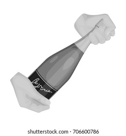 A bottle of champagne in hands. Champagne single icon in monochrome style vector symbol stock illustration web.
