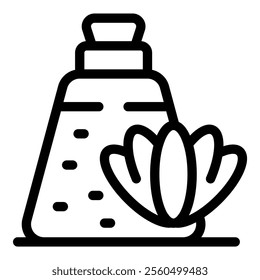 Bottle full of cosmetic product is standing near a flower, suggesting the use of natural ingredients