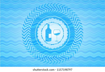 bottle and glass of wine icon inside sky blue water badge background.