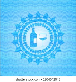 bottle and glass of wine icon inside water concept badge.