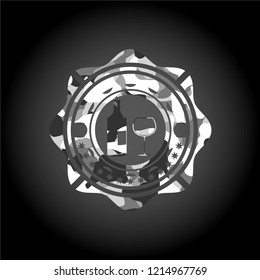 bottle and glass of wine icon inside grey camo emblem