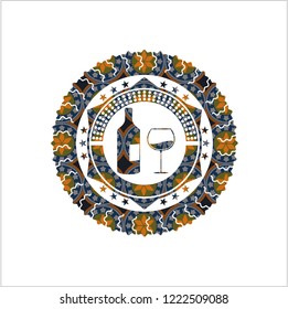 bottle and glass of wine icon inside arabesque badge. arabic decoration.