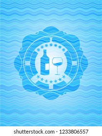 bottle and glass of wine icon inside water wave representation emblem background.