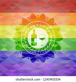 bottle and glass of wine icon inside emblem on mosaic background with the colors of the LGBT flag