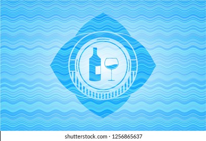 bottle and glass of wine icon inside water wave badge.