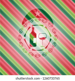 bottle and glass of wine icon inside christmas colors emblem.