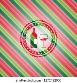 bottle and glass of wine icon inside christmas emblem.