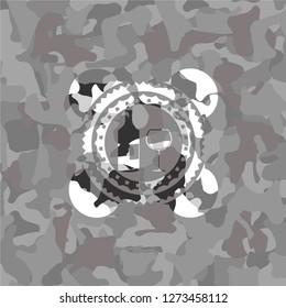 bottle and glass of wine icon inside grey camo texture
