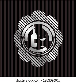 bottle and glass of wine icon inside silvery badge or emblem