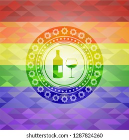 bottle and glass of wine icon inside emblem on mosaic background with the colors of the LGBT flag