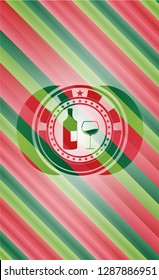 bottle and glass of wine icon inside christmas colors style emblem.