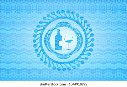 bottle and glass of wine icon inside light blue water emblem background.
